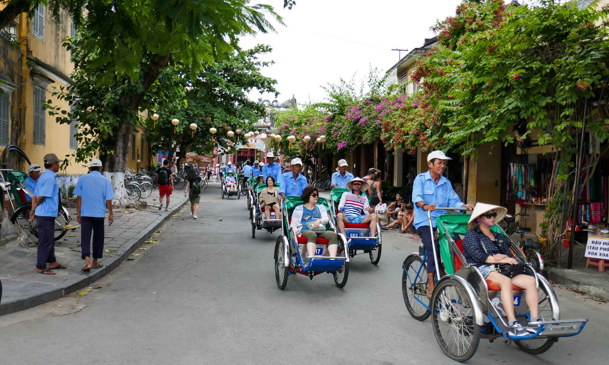 Tourist group on rickshaws in Old Town